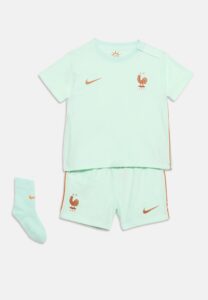 Mint green soccer jersey with orange Nike swoosh and French rooster crest, paired with matching shorts and socks