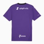 Purple short-sleeve t-shirt viewed from back with white Arabic text and logo on upper back; brand 'SEVEN' at lower back center.