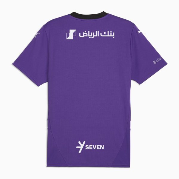 Purple short-sleeve t-shirt viewed from back with white Arabic text and logo on upper back; brand 'SEVEN' at lower back center.
