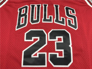 Red Chicago Bulls basketball jersey with the name 'BULLS' and the number 23 visible on the back.