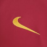 338ce696_d3627b46-b2eb-4c4b-ba5e-7961bdfa3a43 | UAE SPORT STORE Close-up of red fabric with a yellow embroidered crescent.