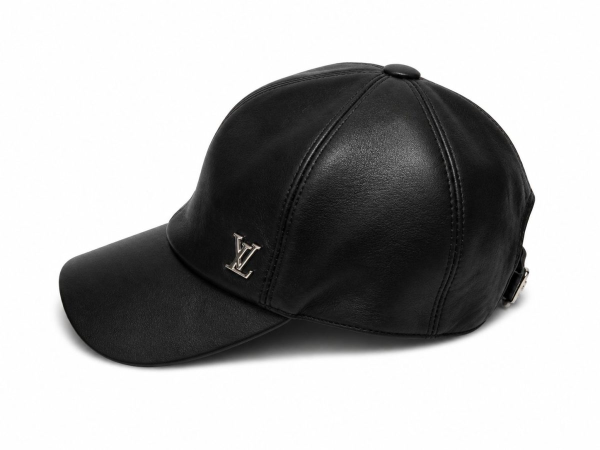 Black leather baseball cap with a small silver LV logo on the front.