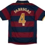 37ad7897-87bf-4eaa-b690-7dc4b2236dd6 | UAE SPORT STORE Soccer jersey with wide blue and maroon horizontal stripes, name Fabregas and large gold number 4 on the back.