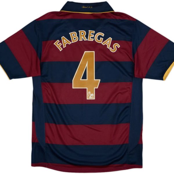 Soccer jersey with wide blue and maroon horizontal stripes, name Fabregas and large gold number 4 on the back.