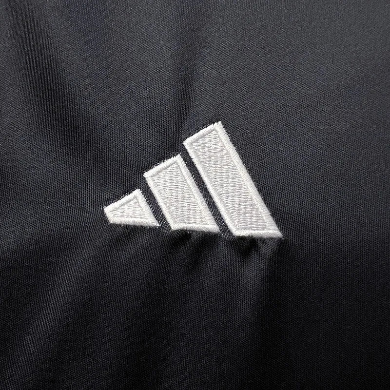 38205d80515a66b4_4fe80a6b-66e1-4c9c-8534-eb455a0d5252 | UAE SPORT STORE Embroidered white Adidas logo on black fabric (three-stripe motif)