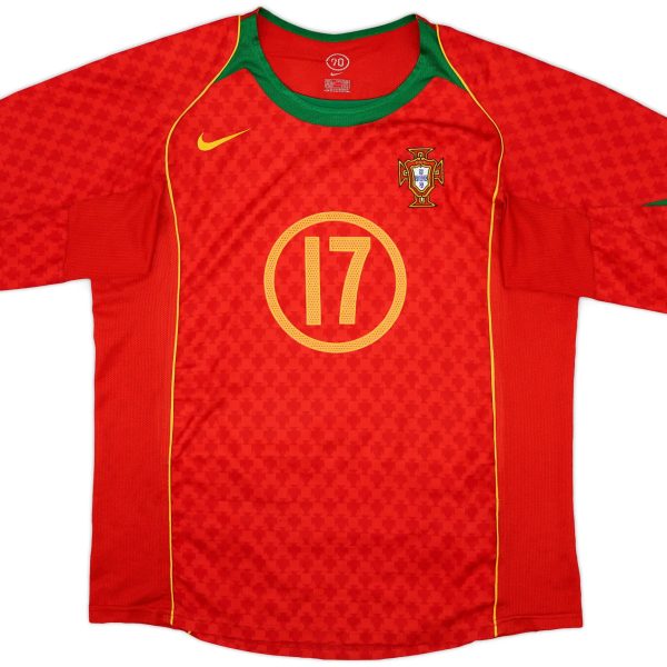 Portugal national football jersey in red with a green collar and yellow trim, featuring a crest on the left chest and a large yellow 10 on the front.