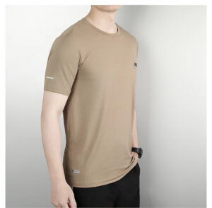 39e78aa9 | UAE SPORT STORE Side-profile of man wearing a tan short-sleeve tee with a small chest logo.