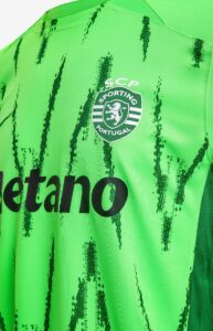 3EcqUoK5eennrkQ | UAE SPORT STORE Green jersey with the SCP Sporting Portugal crest and bold 'Betano' sponsor text visible on the front.