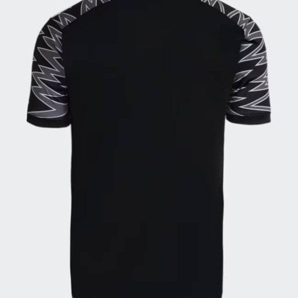 Back view of a black short-sleeve athletic jersey with white zigzag pattern on the sleeves.
