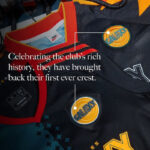 3VtOXvbTkROn05p | UAE SPORT STORE Promotional graphic of a dark jersey with Galaxy patches and the message: 'Celebrating the club's rich history, they have brought back their first ever crest.'