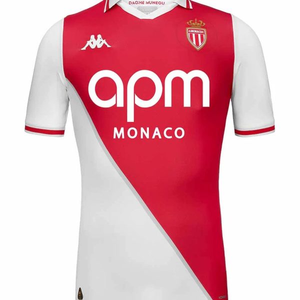 AS Monaco home football jersey featuring a red diagonal panel, white sleeves, club crest, and 'apm MONACO' sponsor text.