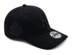 Black New York Yankees logo cap, stylish sports accessory for fans.
