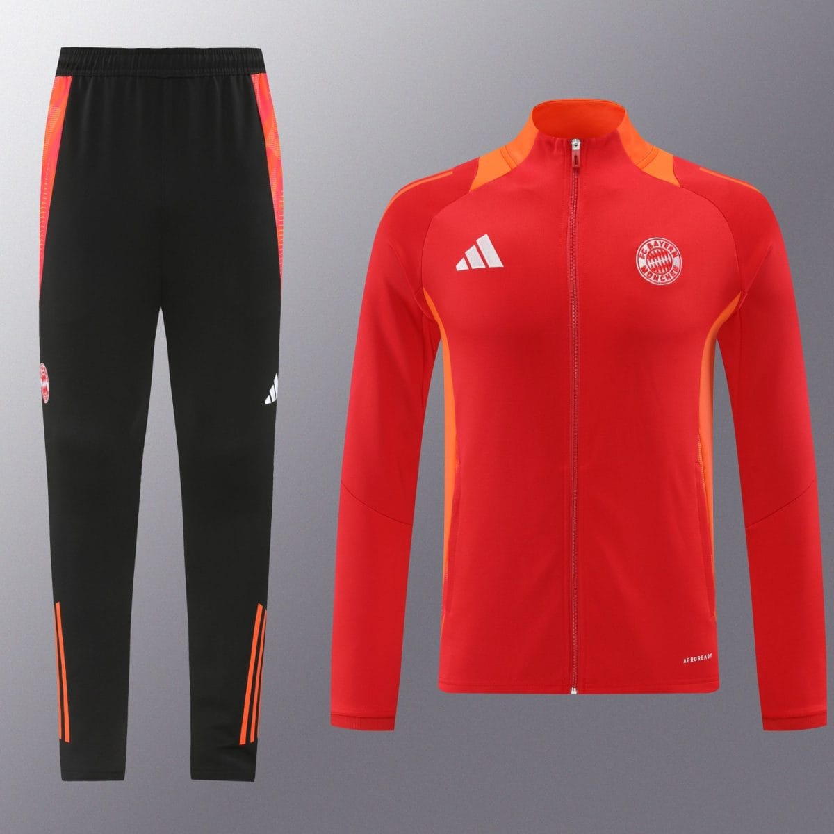 Red athletic jacket with orange piping and Bayern Munich crest, shown beside black performance pants with orange stripes for training wear