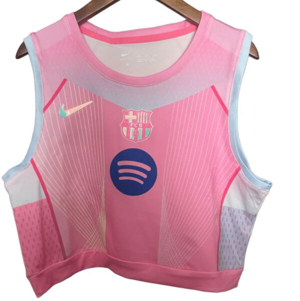 Pink sleeveless gym vest with FC Barcelona crest and Spotify logo on the front.