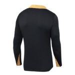Back view of a black jacket with a gold collar and gold accents at the cuffs.