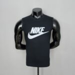 Front view of a black Nike sleeveless tank top on a glossy mannequin bust with the white Nike swoosh logo visible on the chest.