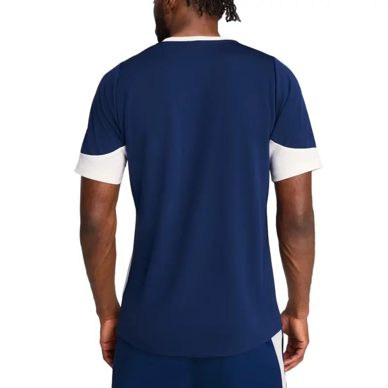 3e7f9fc01c0d4a14b571f12e7c29f816 | UAE SPORT STORE Back view of a person wearing a navy sports jersey with white cuffed sleeves.
