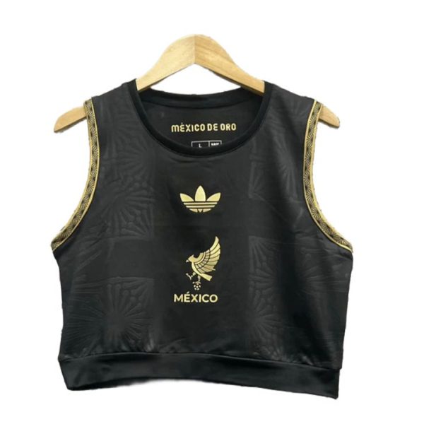Product photo: black sleeveless crop top with gold trim on the armholes and gold México emblems on the front (including the eagle crest and 'MÉXICO' text).