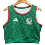 3ff4941ea7398789 | UAE SPORT STORE Green Mexico training jersey with Adidas logo and national crest, sleeveless crop top with red/white trim and circular pattern.