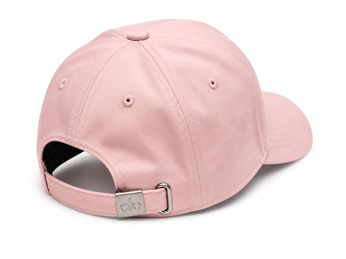 Back view of a pink baseball cap with an adjustable strap and metal buckle.
