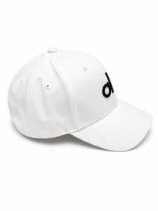 White baseball cap shown from a side angle, featuring black embroidered lettering on the front panel.