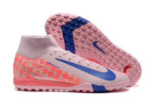 4059b9ba | UAE SPORT STORE Pink athletic shoe with blue Nike Swoosh, knit upper, and a textured pink outsole with blue accents.