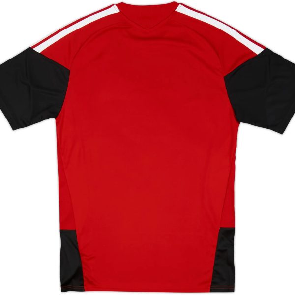 Red athletic jersey with black sleeves and white shoulder stripes. (Back view)