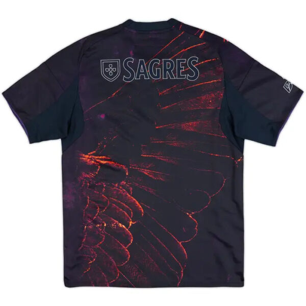 Back view of a dark T-shirt with orange lava-like patterns and a Sagres logo with shield on the upper back.