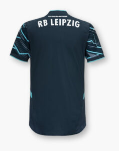 Back view of a dark navy RB Leipzig jersey with teal geometric sleeves and the text 'RB LEIPZIG' across the shoulders.