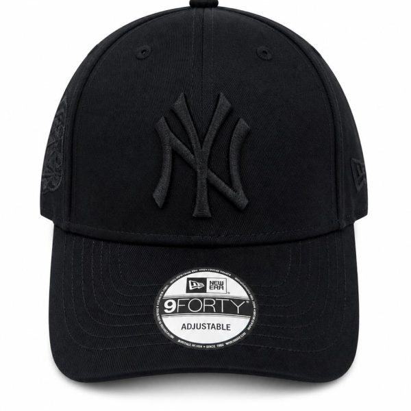 Black baseball cap with the New York Yankees logo, adjustable strap, front view.