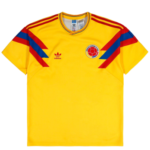 Yellow Colombia national team soccer jersey with diagonal red and blue stripes, featuring the adidas logo and federation crest.