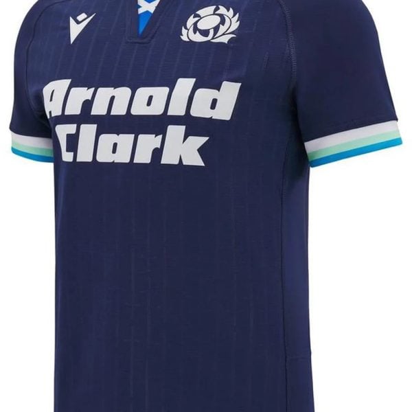 Navy rugby jersey with white collar, Scotland crest on chest, and large 'Arnold Clark' sponsor text across the front, with teal sleeve trim.