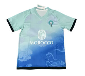 Morocco national soccer jersey with blue gradient, crest on chest and MOROCCO sponsor logo on front.