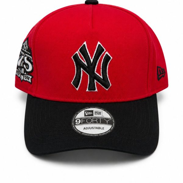 Red Yankees baseball cap with a black brim, large black-and-white NY logo on the front, adjustable.