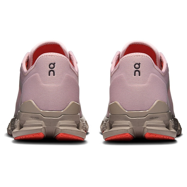 457377_422_234_59_c | UAE SPORT STORE Pair of pink running shoes shown from the back, with beige heel caps and red outsoles, featuring an 'ON' logo.