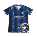 Inter Milan-style soccer jersey with blue and black vertical stripes, white Nike swoosh, round collar, team crest, and Betsson Sport sponsor text across the chest, plus a white graffiti design on the lower right.