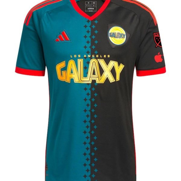 Split-color LA Galaxy jersey with teal left and black right, bold yellow GALAXY logo, red trim, and sponsor/brand marks on chest and sleeves