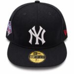 Black fitted cap with white NY Yankees logo, side MLB patch, and red New Era logo on the opposite side; gold 59FIFTY sticker on brim