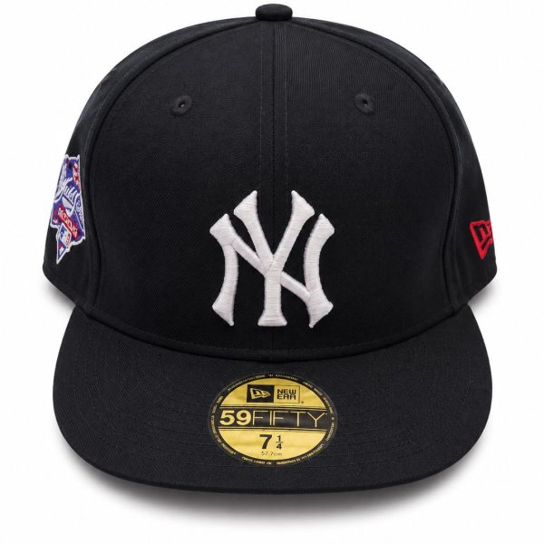 Black fitted cap with white NY Yankees logo, side MLB patch, and red New Era logo on the opposite side; gold 59FIFTY sticker on brim