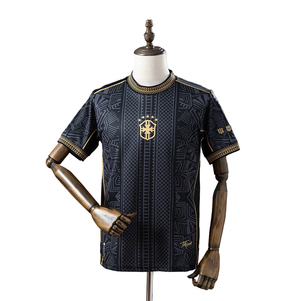 4e88d07c Black and gold patterned soccer jersey on a dress form, featuring crest and stars.