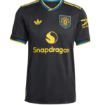 Front view of a black Manchester United football jersey with yellow trim, club crest, Adidas logo, and Snapdragon sponsor.