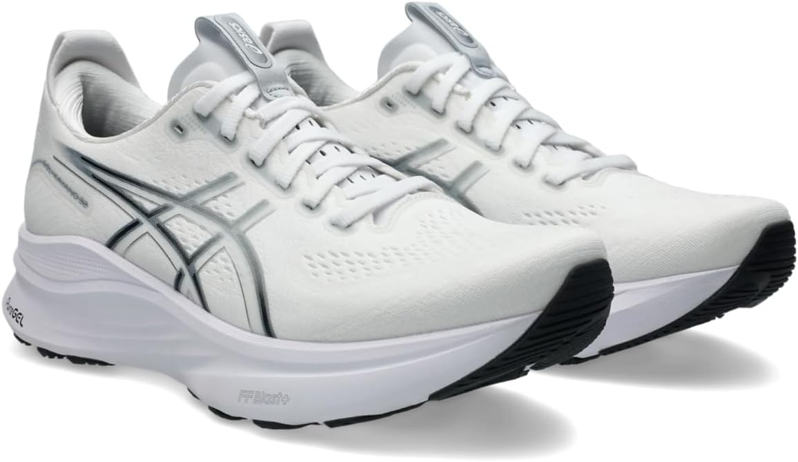 518fRqSXtqL._AC_SY695 | UAE SPORT STORE Pair of white running shoes with a thick cushioned midsole and black outsole accents on the toe area.