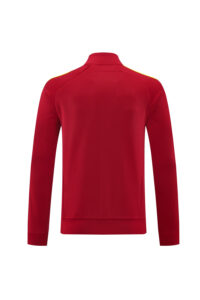 Back view of a red jacket with a yellow shoulder stripe, standing out against a plain background.