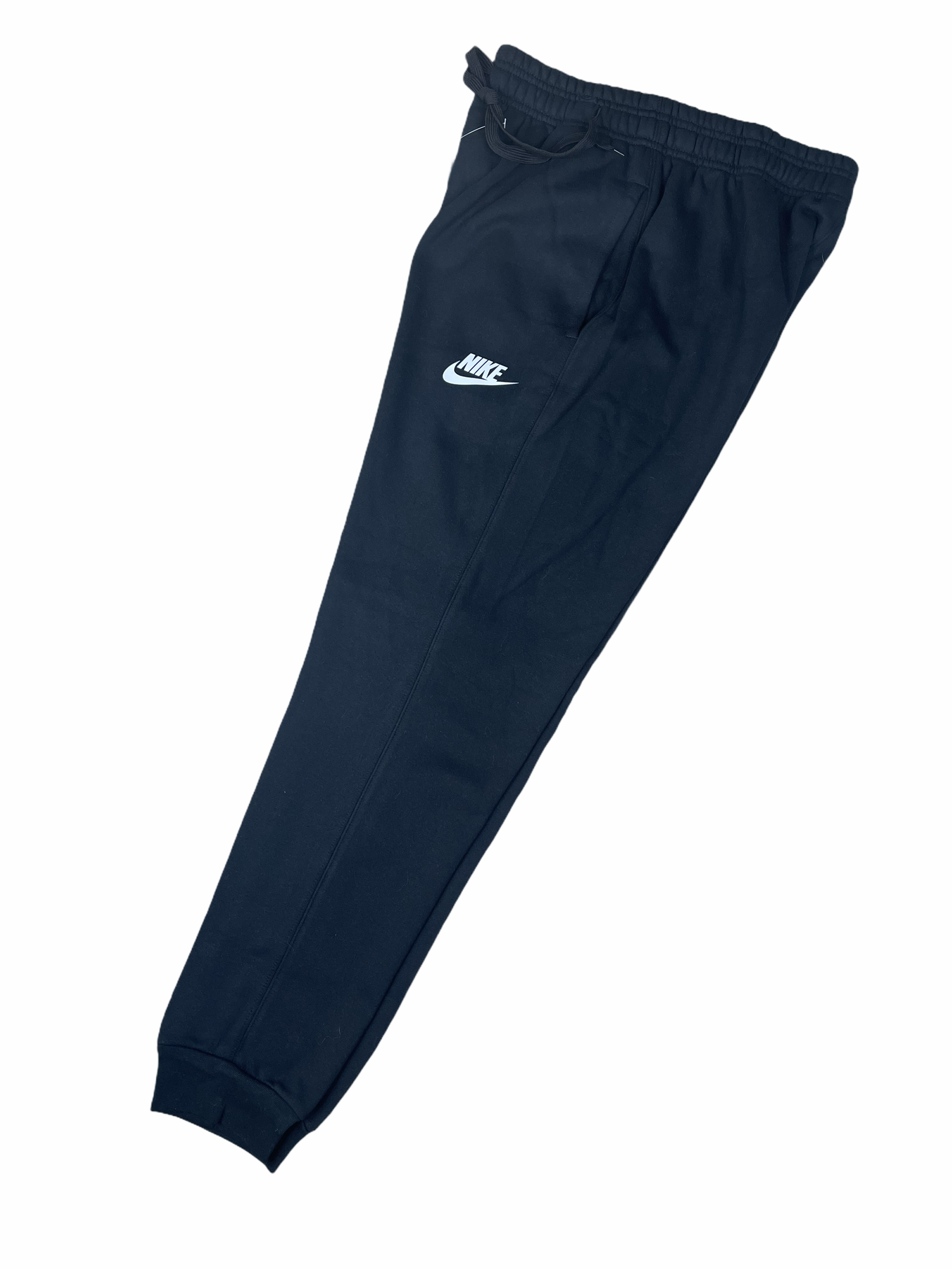 52E7AC59-F64D-4B36-8928-6A76E7F0CF33_46a10461-d7d5-4635-b9a8-735a49063617 | UAE SPORT STORE Navy Nike jogger pants folded along leg with drawstring waistband and white swoosh logo on thigh