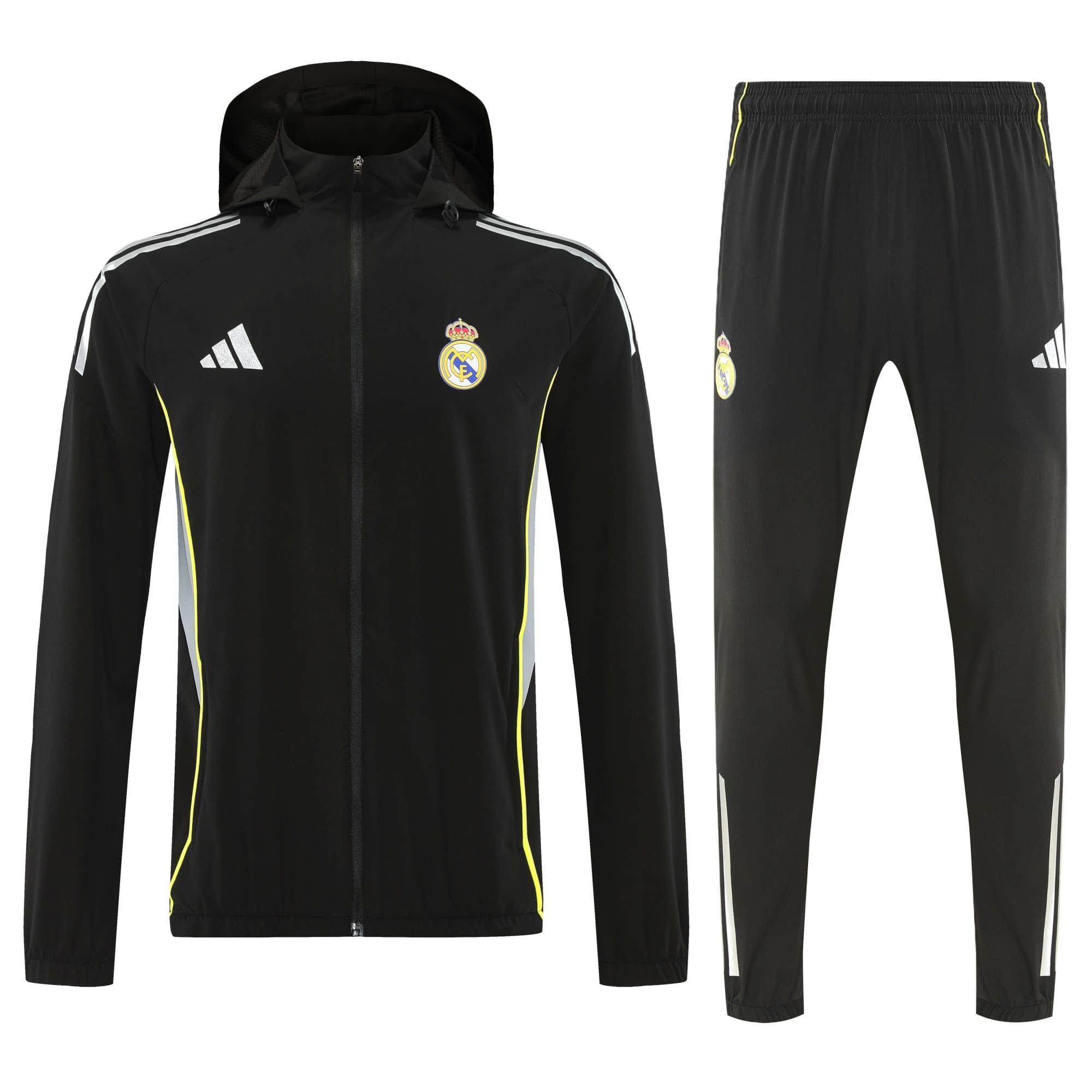 52fccff0 | UAE SPORT STORE Black Real Madrid tracksuit: hooded zip-up jacket with white side stripes and crest, paired with matching black pants featuring neon-yellow piping.