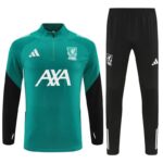 53f97d80-c7f1-4f80-b93f-9fc1a7459419 | UAE SPORT STORE teal training jersey with black sleeves and matching pants, features AXA sponsor and club crest on chest, Adidas logo visible