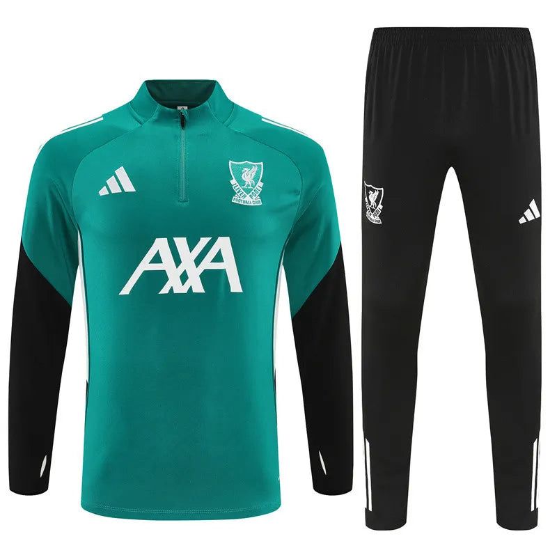 53f97d80-c7f1-4f80-b93f-9fc1a7459419 | UAE SPORT STORE teal training jersey with black sleeves and matching pants, features AXA sponsor and club crest on chest, Adidas logo visible