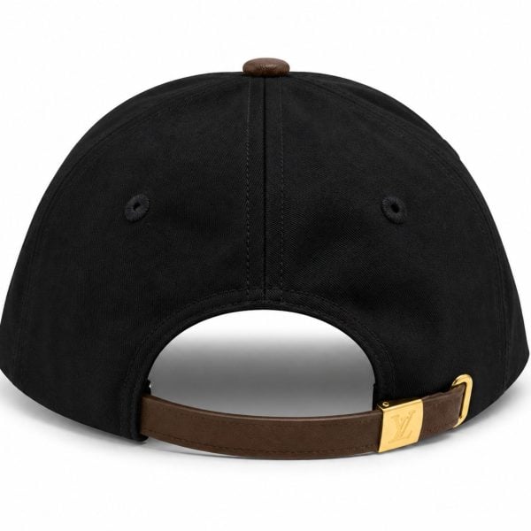 Black cap viewed from the back with a brown leather strap and gold LV buckle. Top button visible on the crown.