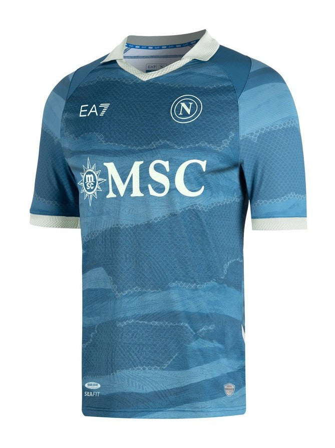 56R9RZcWE65VLno Blue soccer jersey with light stripes and white collar, featuring MSC sponsor and circular crest on chest.