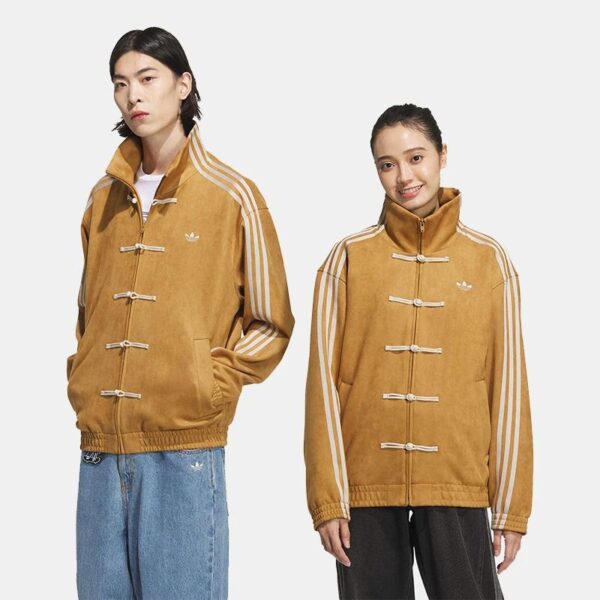 Two models wearing mustard duffle jackets with white striped sleeves, posing against a white backdrop/setting a casual look.